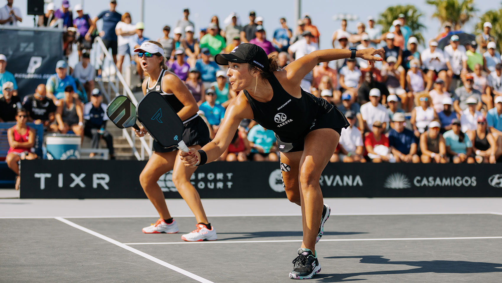 Women playing pickleball