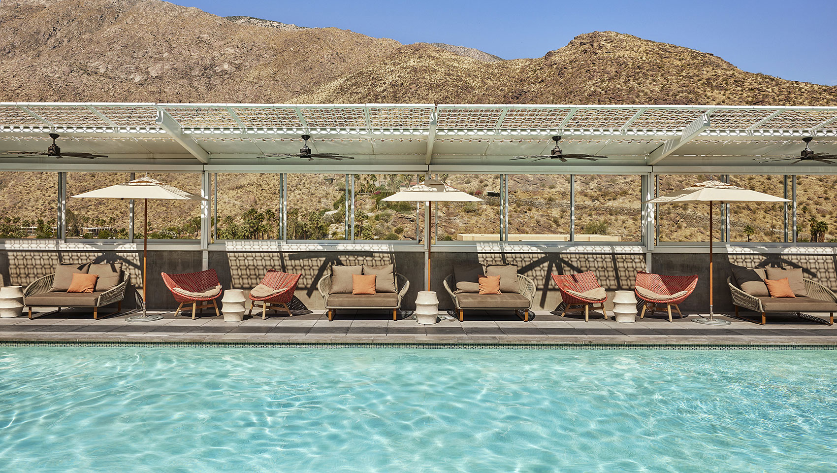 rowan pool deck with chairs and mountain view