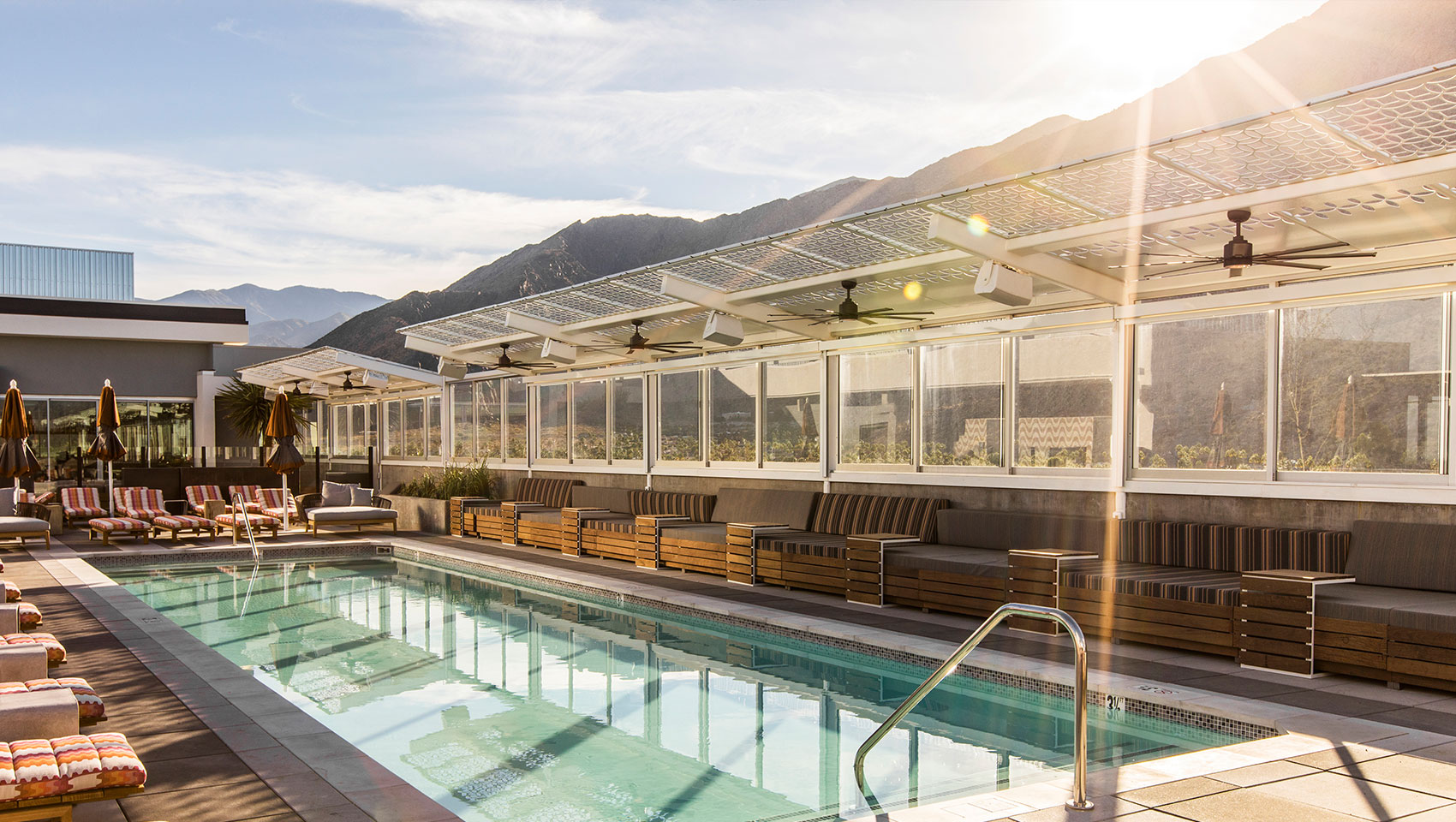 Rowan Palm Spring Pool Deck with Day Beds overlooking the mountains